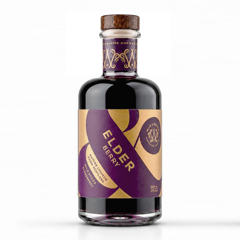 A 500ml bottle of Wild & Wonder Elder Berry Original elderberry & meadowsweet liqueur with a purple and gold label, purple neck label and wooden stopper, on a white background.