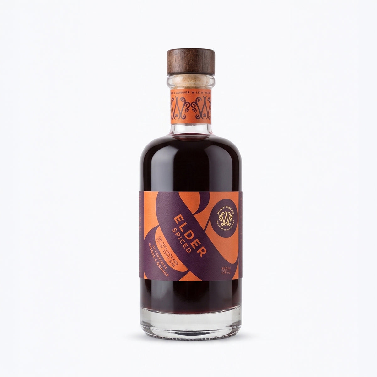 A 200ml bottle of Wild & Wonder Elder Spiced elderberry, ginger & orange liqueur with a dark amber liquid, dark purple and orange label and wooden stopper.