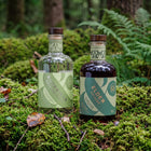 Wild & Wonder Orchard Bundle: a bottle of Silvertear Orchard apple & bay leaf vodka and a bottle of Elder Orchard elderberry, bramble & apple liqueur.