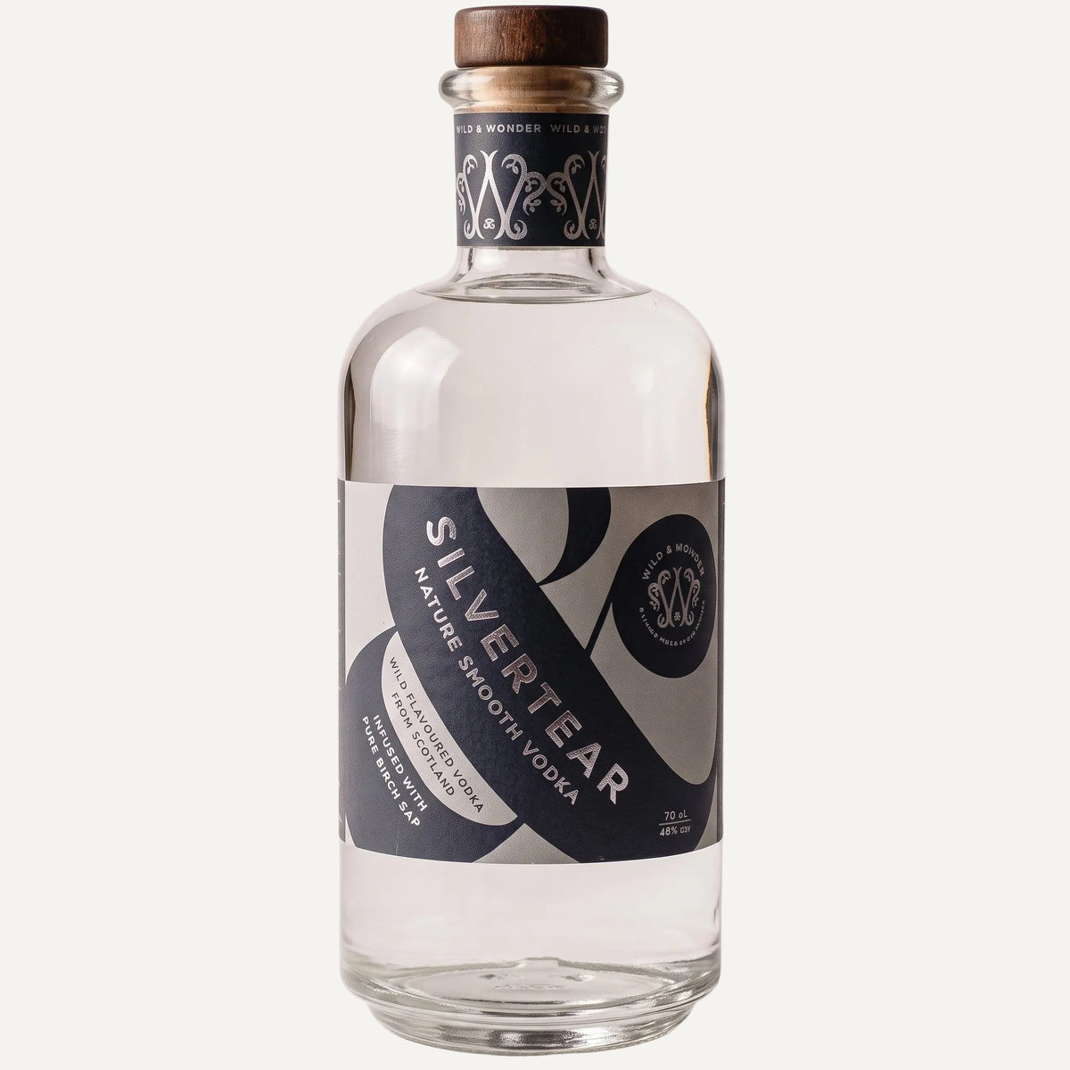 A bottle of Silvertear Nature Smooth vodka with a navy and grey label and dark wooden stopper
