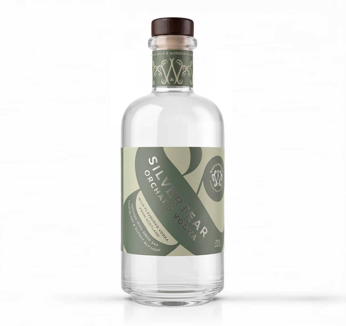 A bottle of Silvertear Orchard Vodka on a solid white background. The clear glass bottle features a dark brown wooden stopper and a label with olive green and light green graphics.