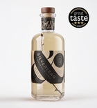A bottle of Silver Tear Vintage Birch Vodka on a clean white background, featuring a black and beige label with a brown wooden cap. A 'great taste 2026' award badge is displayed in the top right corner.