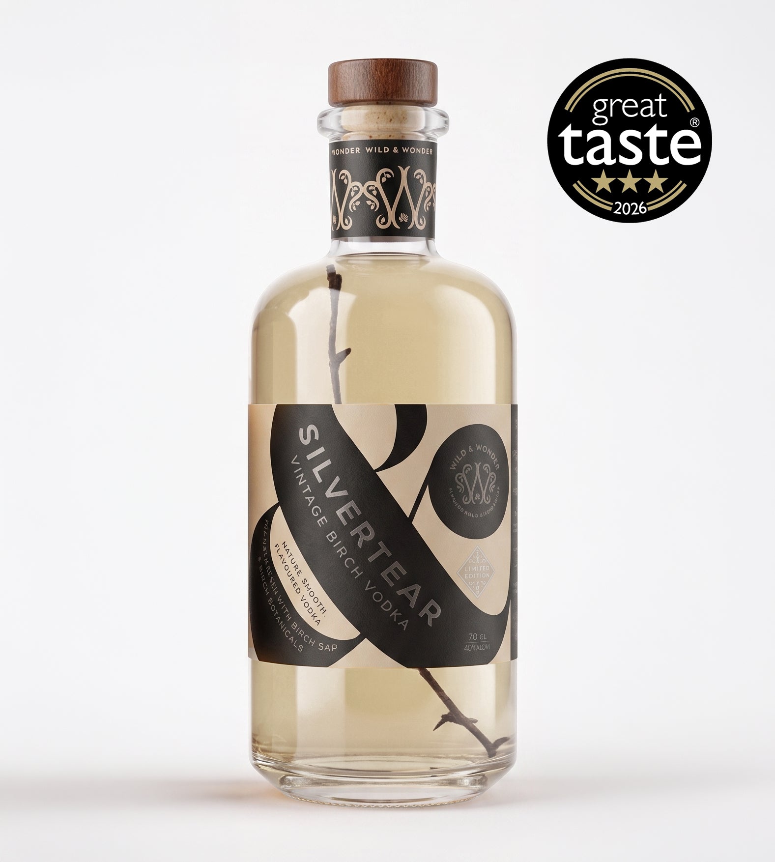 A bottle of Silver Tear Vintage Birch Vodka on a clean white background, featuring a black and beige label with a brown wooden cap. A 'great taste 2026' award badge is displayed in the top right corner.
