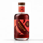 Bottle of Wild & Wonder Rosehip Spritz liqueur with botanical ingredients. Rosehip and rum flavour